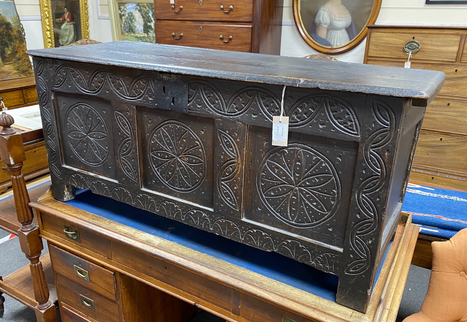 A late 17th century carved oak coffer, length 119cm, depth 46cm, height 54cm